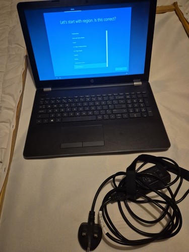 Laptop with charger - hp,