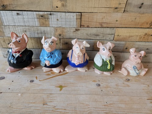 Three halifax pigs piggy banks - halifax,
