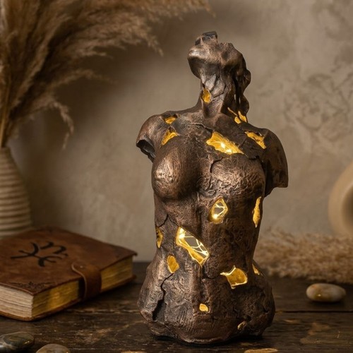 Abstract bronze female torso - female,
