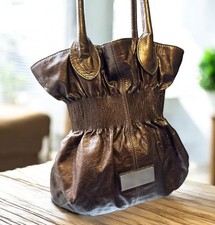 Coccinelle Golden Bronze