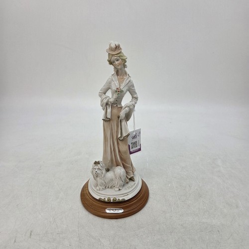 Belcari lady walking dog - belcari,