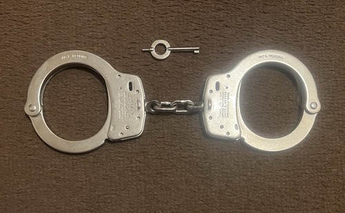 Smith wesson handcuffs and - &,