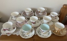 ELEVEN MISMATCHED VINTAGE BONE CHINA CUPS SAUCERS PLATES TRIOS 