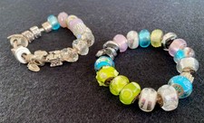 TWO RHONA SUTTON CHARM BRACELETS