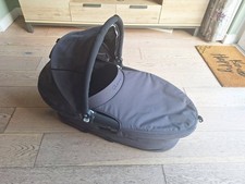 Black/Grey, Quinny carrycot. In excellent condition, used a few times.
