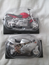 DUCATI AND BMW  1-18 SCALE  MAISTO MOTORCYCLE MODELS WITH PLINTHS