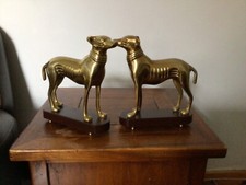 Pair  Brass  Lurcher/ Greyhound dogs on wooden plinths decorative sculptures