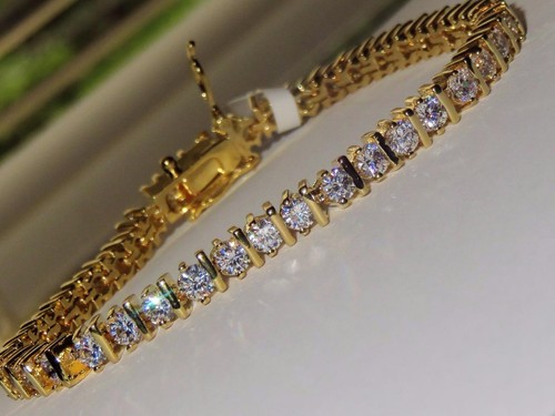 Ladies gold tennis - bracelet, cz