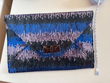 UNTOLD evening/clutch bag with blue/purple and black sequins. Good condition.