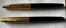 Two Vintage PARKER Fountain Pens Black Gold Colour Tops One Pump One Catridge