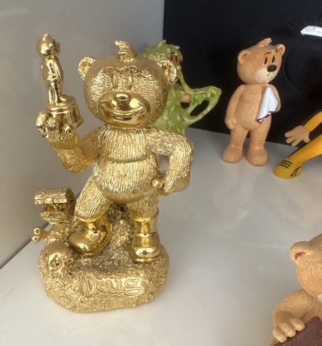 Gold colour bear figurine - bear,
