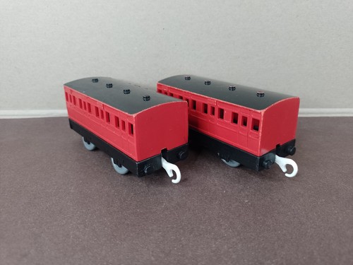 Two red and - coaches,