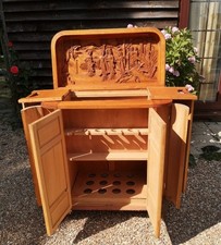 carved wooden drinks cabinet