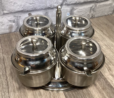 4 Piece Stainless Steel Condiment Set With Lids And Spoons Rotating 
