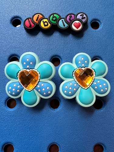 Pair flower with - of,
