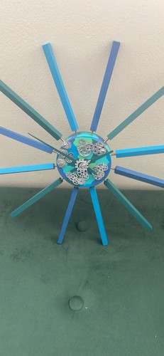 Blue teal sunburst - &,