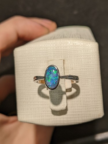 Solid black opal - white, gold