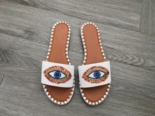 Women’s White Beaded Evil