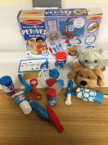 Examine treat pet vet - treat,