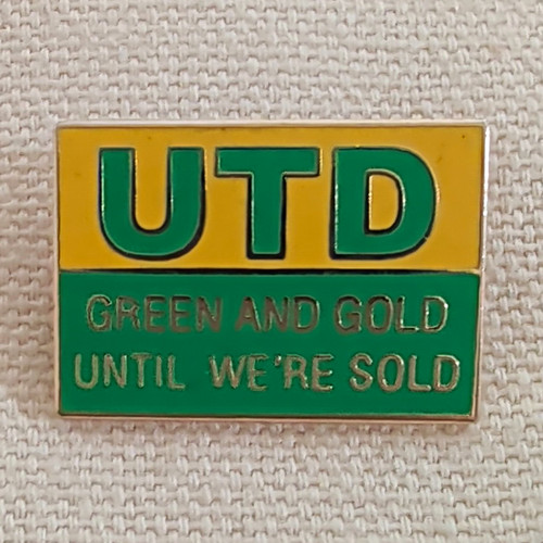Utd green and gold - gold, until