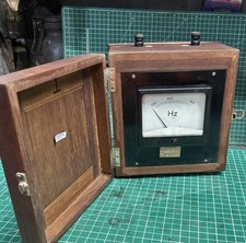 vintage wooden-cased frequency