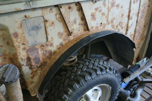 Rear wheel arch quarter - wheel, to