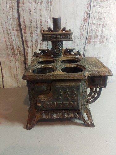Antique queen cast iron cook - antique,