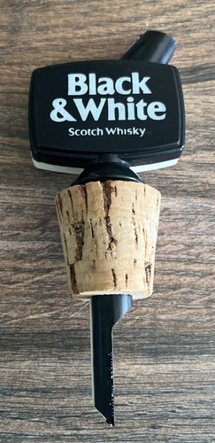 Vintage black white whisky - &,