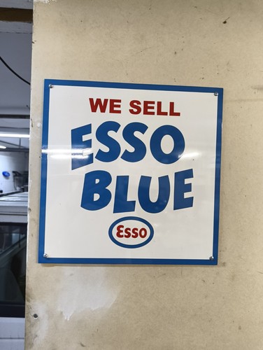 Hand made esso - made, sign