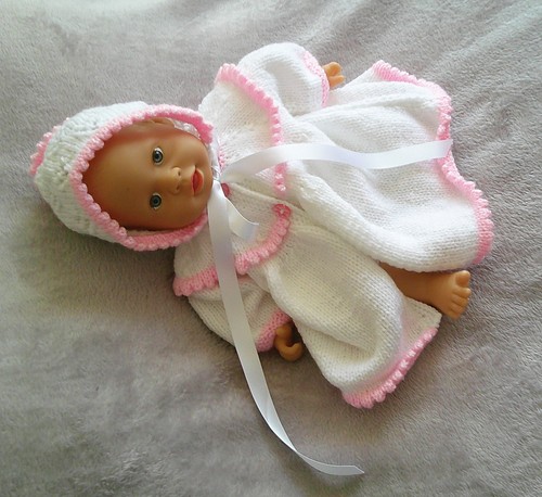 Hand knitted dolls clothes