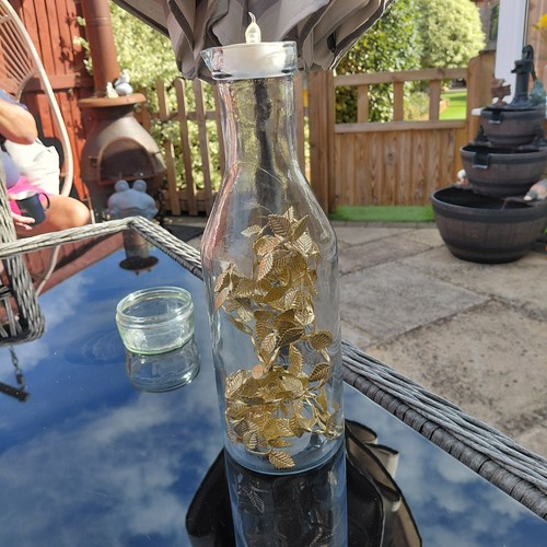Glass bottle wiv gold - bottle,