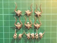 Warhammer 40K - 12 Chaos skulls Base decor - 40k bits