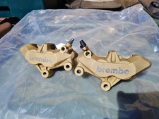 A Pair Of Gold Brembo 4 Piston
