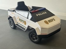 RiiRoo Tesla Cyber Truck Police Ride-On Car - Discontinued - Good Condition