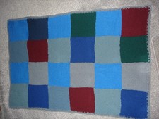 Hand knitted squares, blanket, throw, size 48 ins. x 33 ins. New