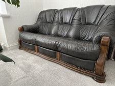 Excellent Leather 2 Seater & 3 Seater Sofas in Black with Woodwork and studs
