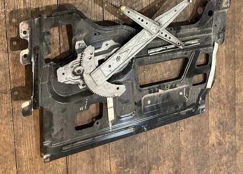 Defender door window mechanism - window,