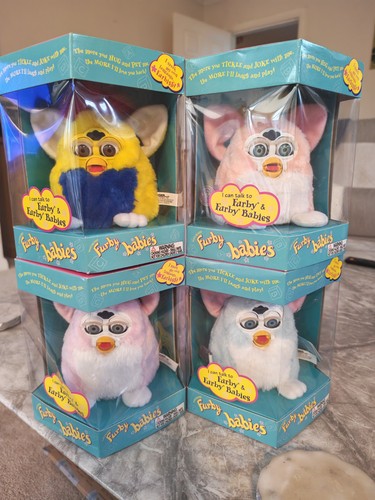 Four furby babies sealed - furby,