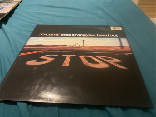 Oasis stop crying your - crying,