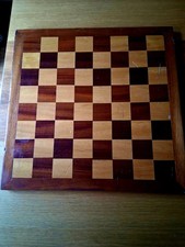 A wooden CHESS board