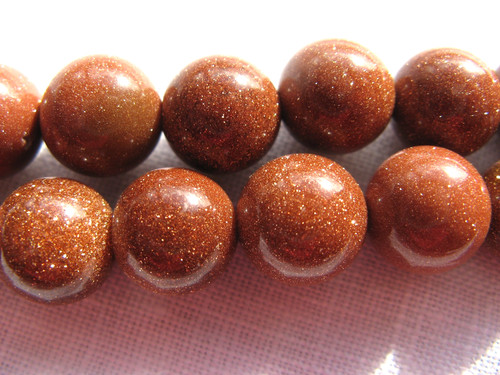 Golden sandstone round - golden, beaded