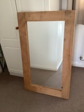 Large heavy rustic wooden Mirror. Measures  116cm x 79cm x 3.5cm.