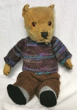Hand knitted teddy bear