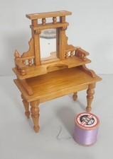 Antique dolls house dressing