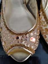 ladies gold sandals. size 5