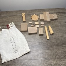 18 WOODEN BUILDING BRICKS IN