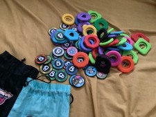huge collection of collectible and rare multicoloured BUMPEEZ chips, pogs, rings