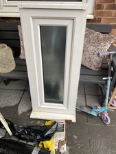 small uPVC double-glazed window with frosted glass