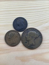 1859, 1895 Farthings and 1858 half penny Queen Victoria coins. 