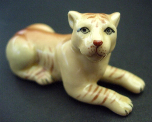 Ceramic lioness figurine lying - lioness,